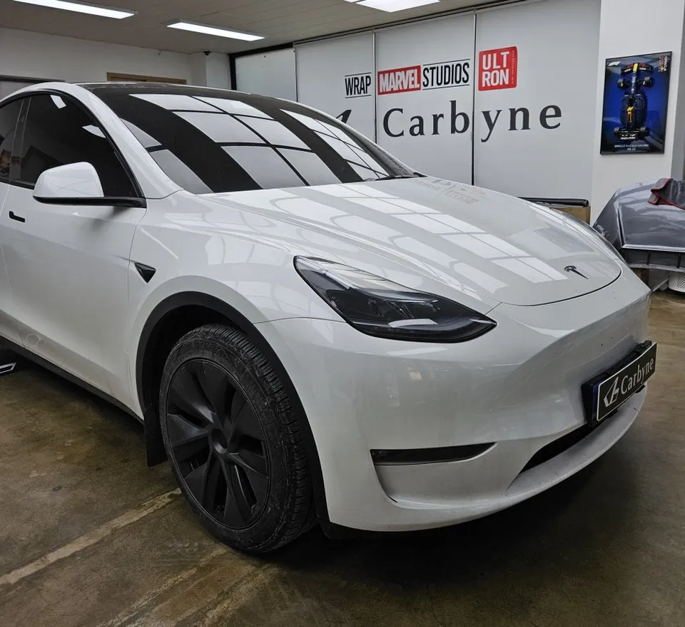 Tesla Model Y vinyl wrap - Tesla Model Y Vinyl Wrap Review: Matte Satin Black Transformation photo 3