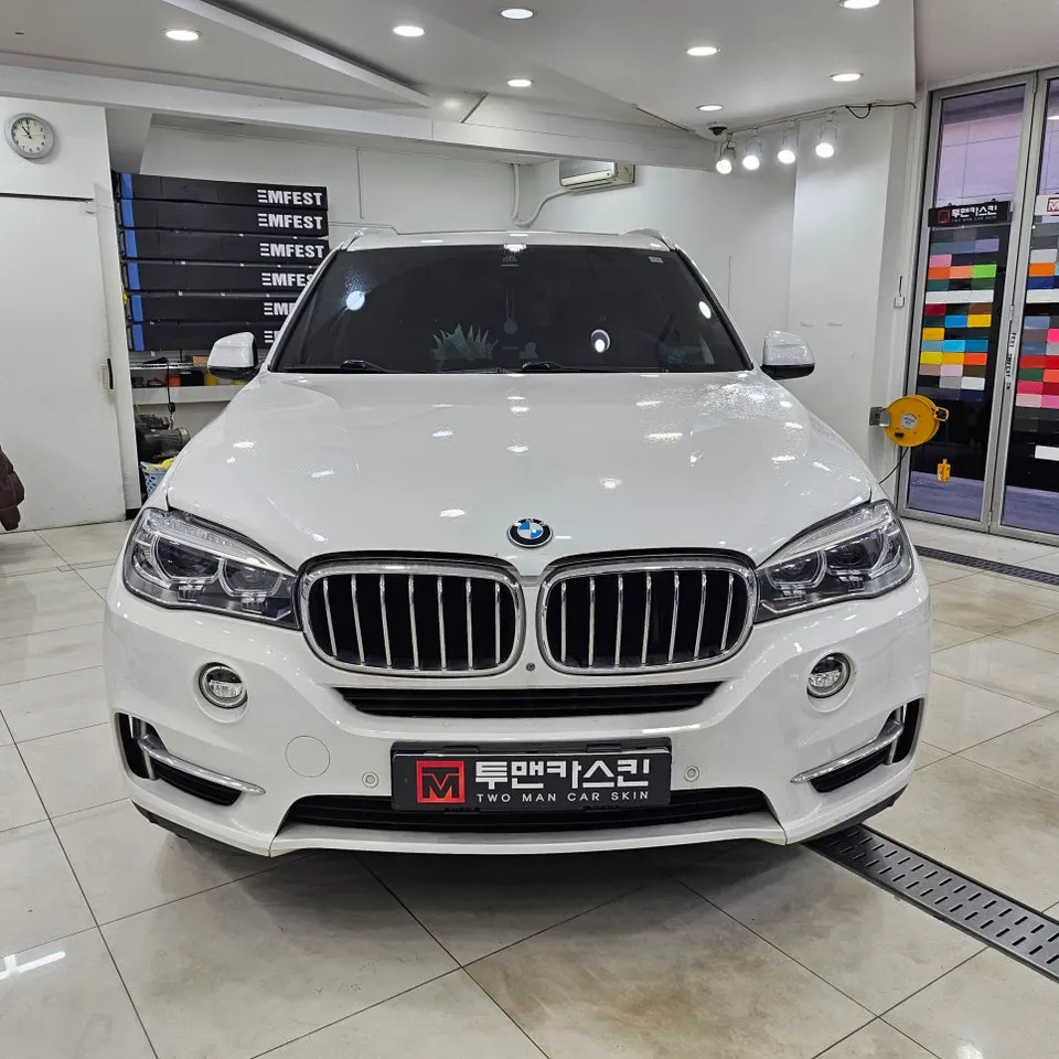 BMW X5 Vinyl Wrap Review: Satin Black Cost & Results photo 2