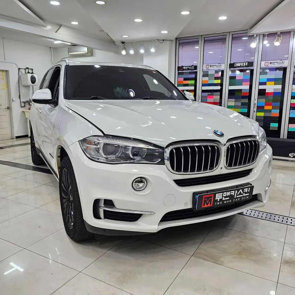 BMW X5 vinyl wrap - BMW X5 Vinyl Wrap Review: Satin Black Cost & Results photo 3