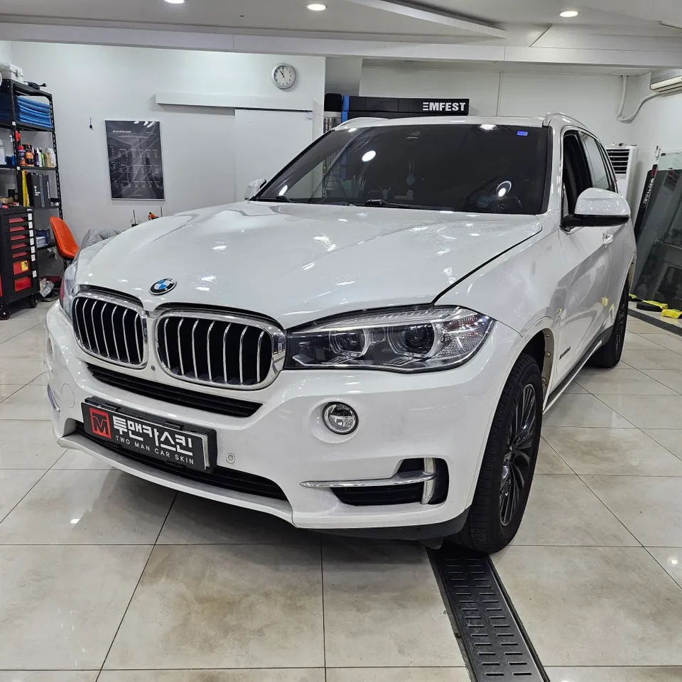BMW X5 vinyl wrap - BMW X5 Vinyl Wrap Review: Satin Black Cost & Results photo 4
