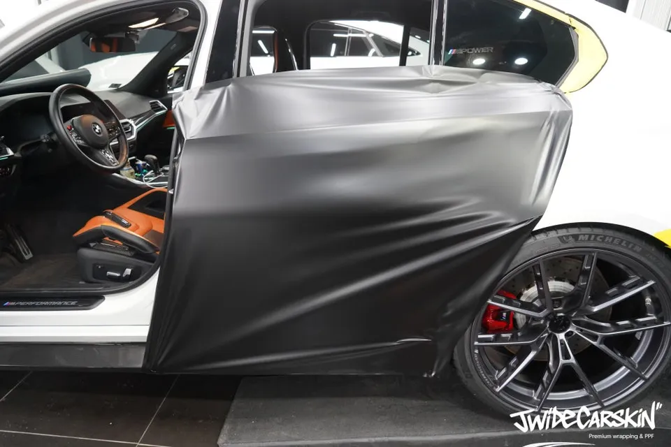 BMW M3 G80 vinyl wrap - BMW M3 G80 Vinyl Wrap Review — Satin Black Finish & Paint Protect photo 6