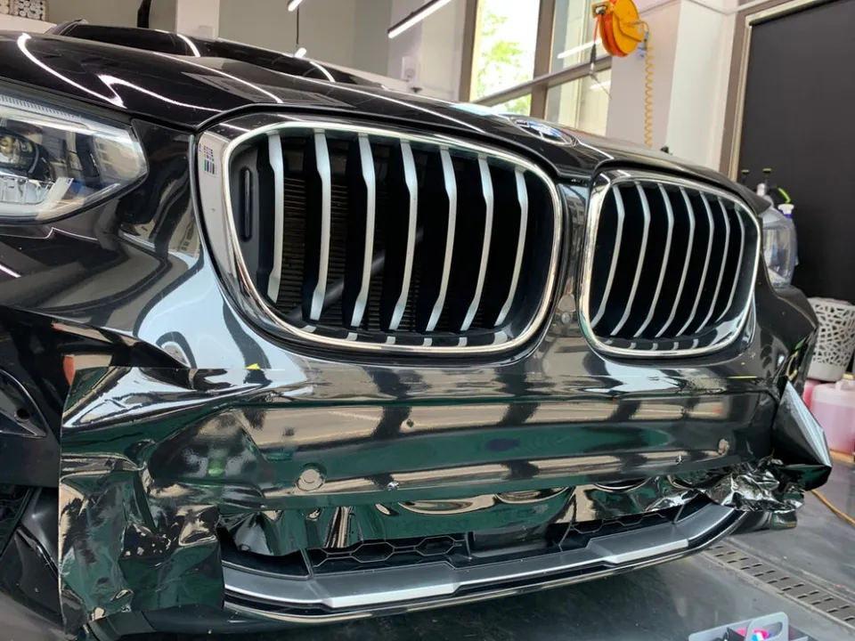 BMW X4 vinyl wrap - BMW X4 Vinyl Wrap Review: Gloss Black Lower Trim Upgrade photo 3