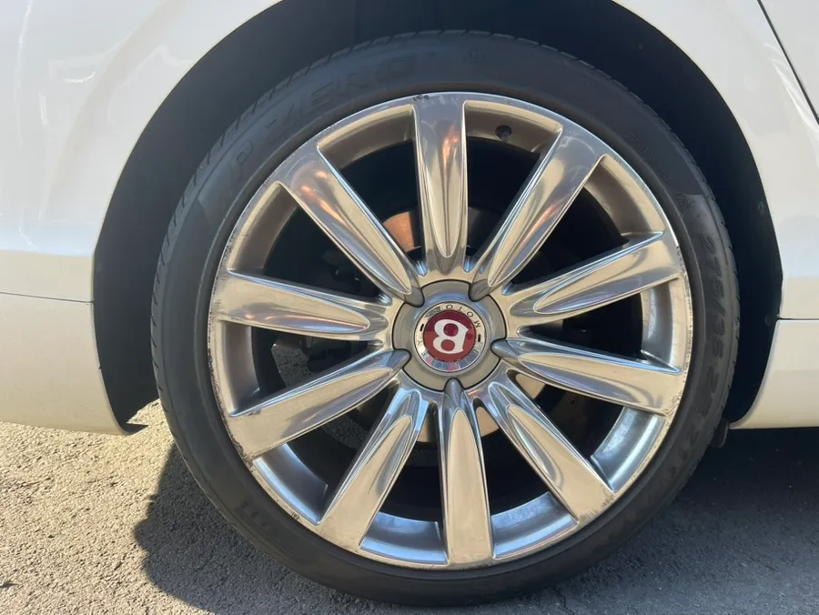 Bentley Flying Spur wheel repair - Bentley Flying Spur Wheel Repair Review - Hyper Silver Refinish photo 5