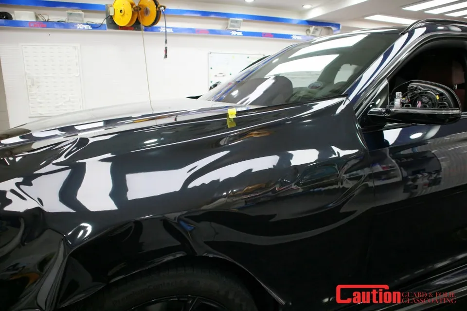 BMW X6 vinyl wrap - BMW X6 Vinyl Wrap Review: High Gloss Black Transformation photo 6