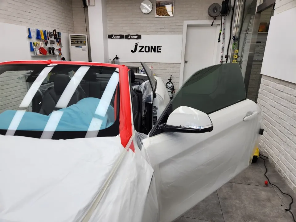BMW i5のカーフィルム施工事例|費用目安・仕上がり 施工写真 2-3