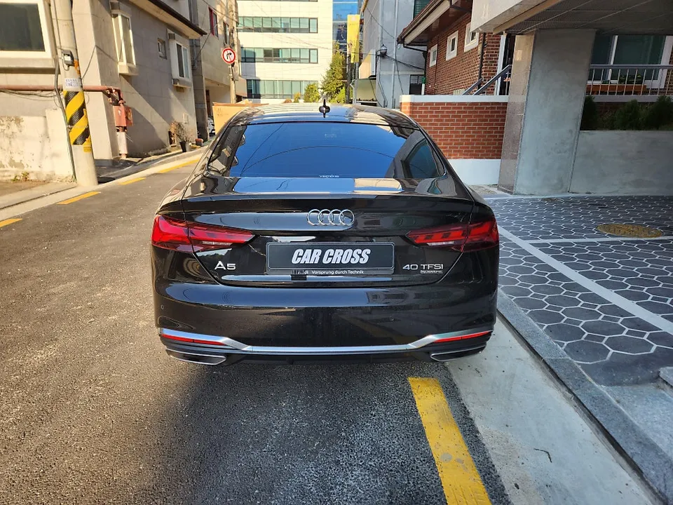 Audi A5 vinyl wrap - Audi A5 Vinyl Wrap Review: Chrome Delete Cost & Results photo 3