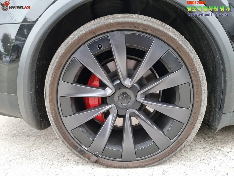 Tesla Model X wheel repair installation result