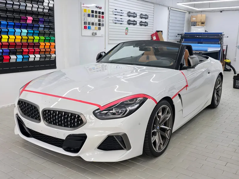 BMW Z4のカーラッピング事例｜キャンディブルーの再施工 施工写真 3-2