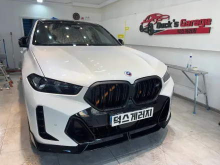 BMW X6のカーラッピング事例｜サテンブラックの高級感 写真