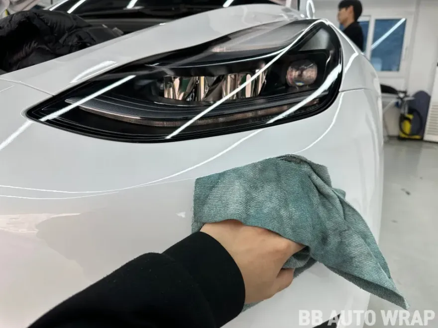 Tesla Model Y vinyl wrap - Tesla Model Y Vinyl Wrap Review: Satin Yellow Cost & Results photo 3