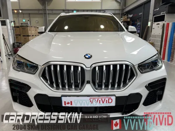 BMW X6 G06 カーラッピング事例：クロームパーツをブラック化 施工写真 3-1