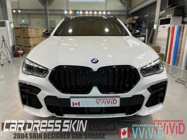BMW X6 G06 カーラッピング事例：クロームパーツをブラック化 施工写真 1-2