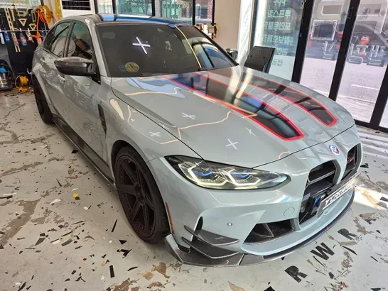 BMW M3のカーラッピング事例|高光沢ブルーフィルム 施工写真 2-1