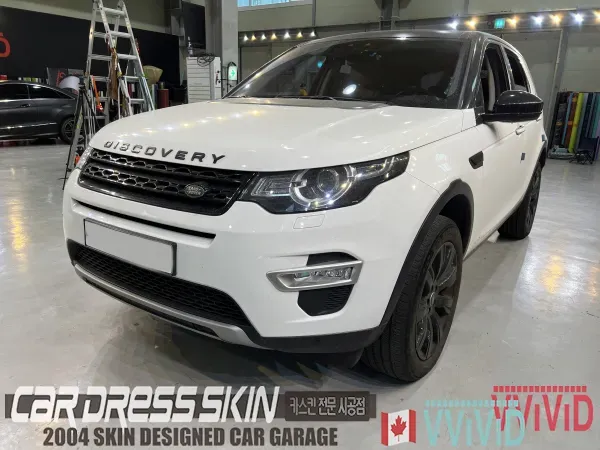 Land Rover Discovery Sportのカーラッピング事例｜ミントカラーの仕上がり 施工写真 3-1